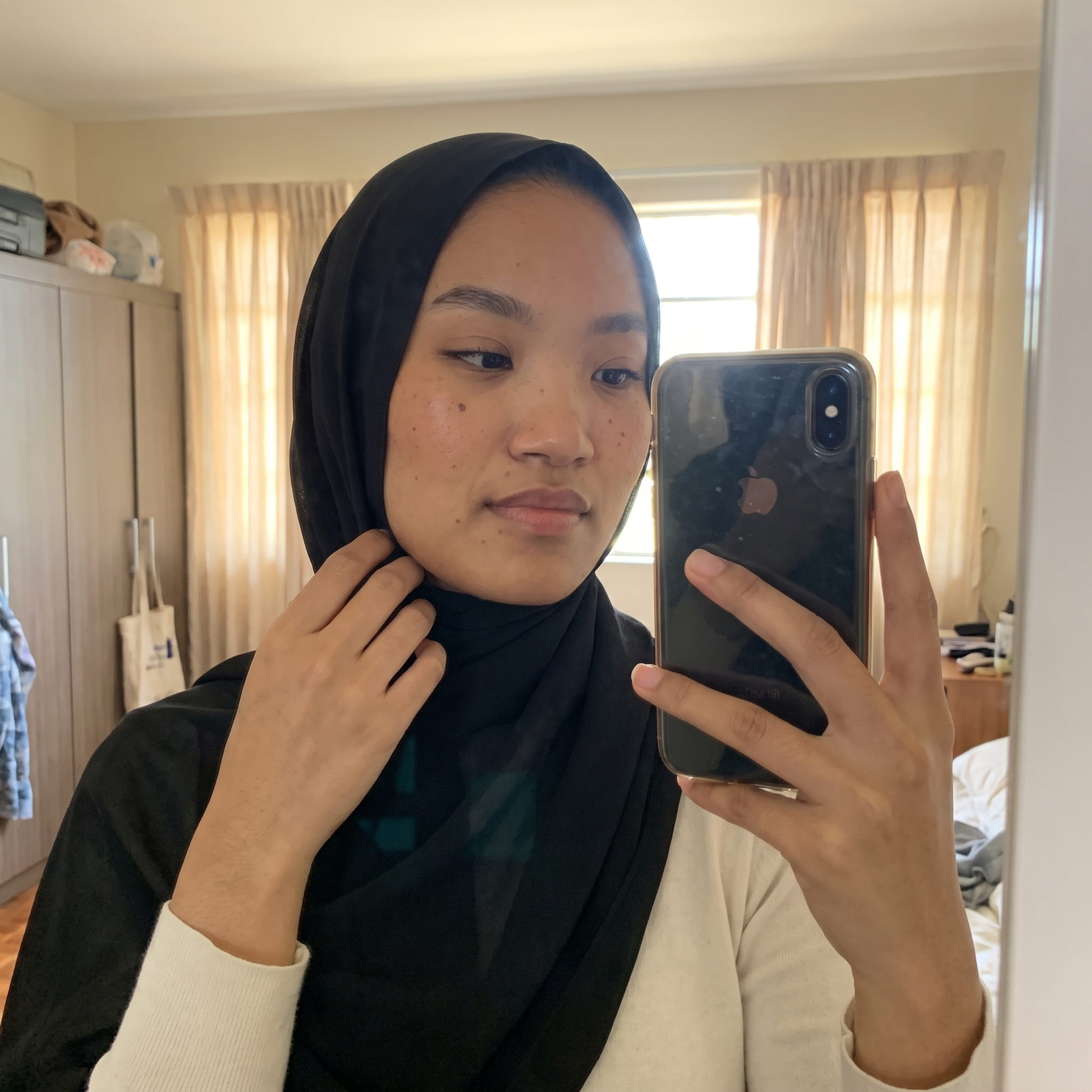 One simple step - the pre-shaped hijab slips on without pins or wrapping