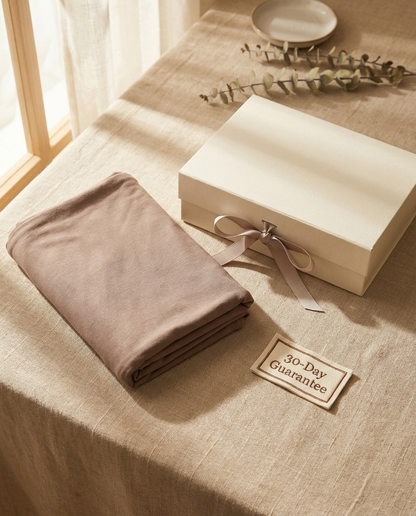 Vaelora jersey long khimar folded beside gift box with 30-day guarantee badge