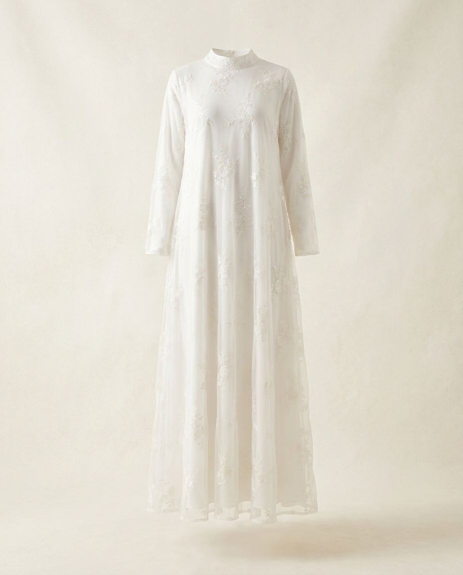 White embroidered double-layer abaya full length on invisible mannequin, studio shot