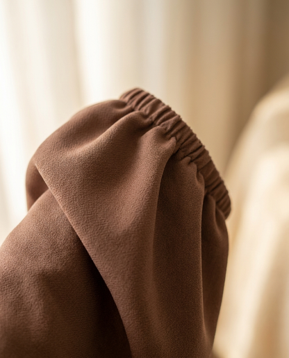 Close-up of soft textured nida fabric and elastic cuff of the Vaelora summer abaya
