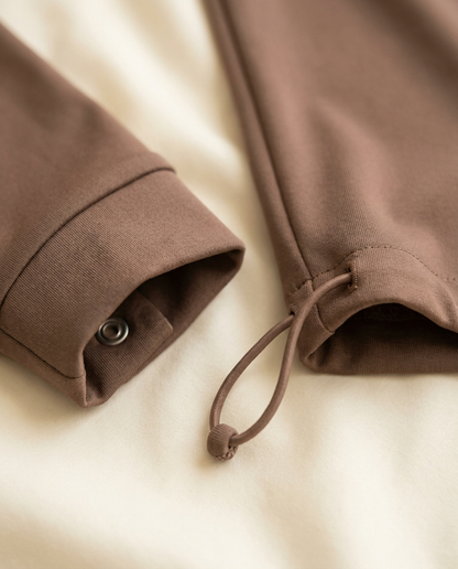Close-up of quick-dry burkini fabric with sleeve snap button and ankle drawstring